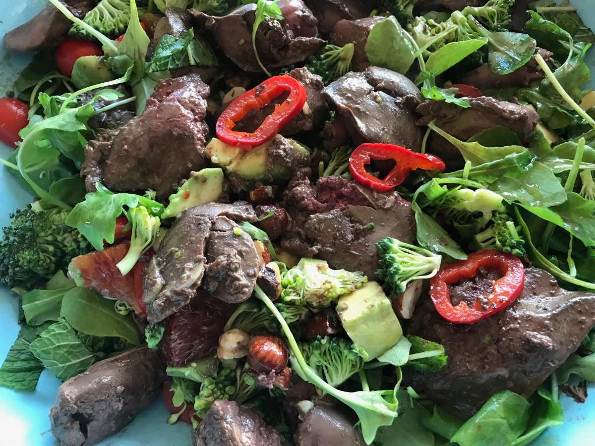 Power salad of chicken livers and sherry with orange and fresh mint